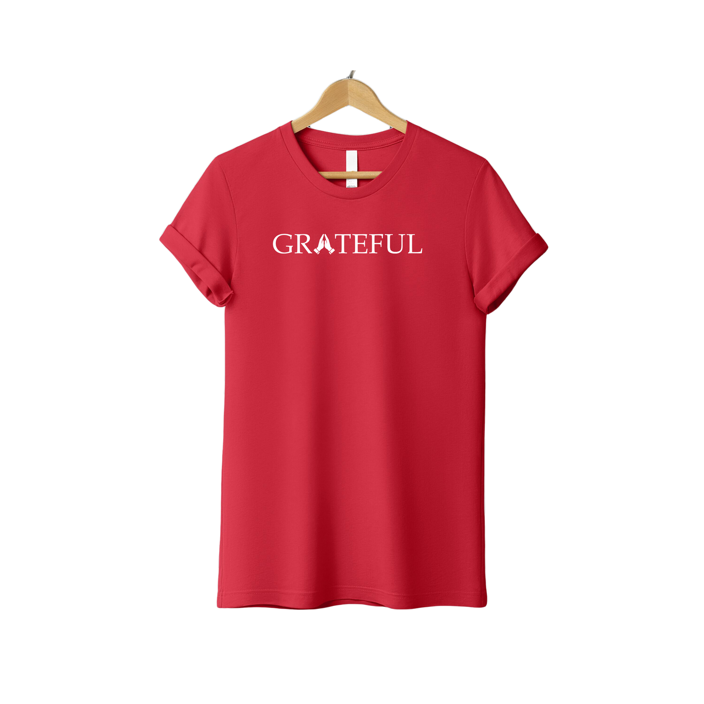 Red Christian T-shirt on hanger with white “GRATEFUL” text featuring praying hands in the center, faith-based gratitude tee
