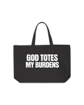 Large black 100% cotton canvas Christian faith tote bag with bold white block lettering that reads God Totes My Burdens. Zipper closure, interior pocket, and sturdy shoulder handles.
