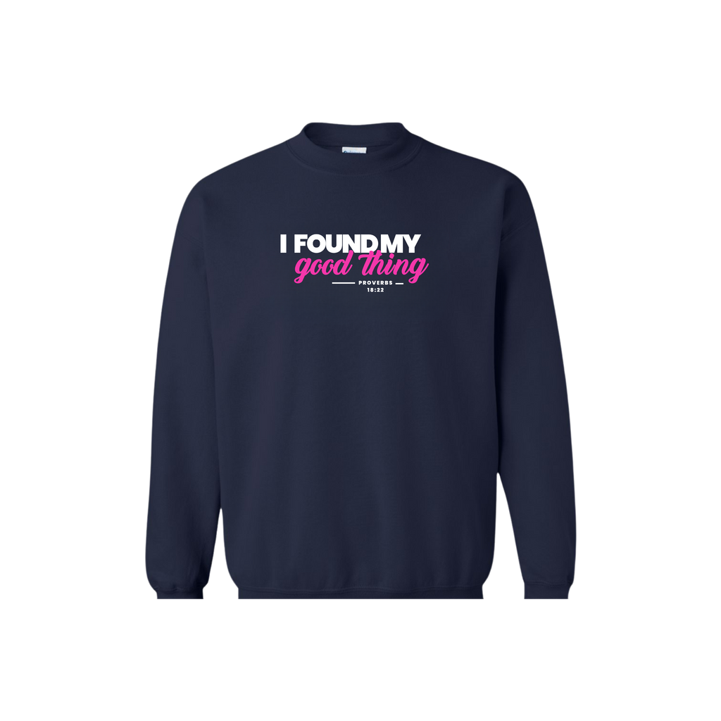 Navy blue crewneck sweatshirt with bold white and pink text that reads "I Found My Good Thing – Proverbs 18:22"; Christian sweatshirt for men, perfect gift for husbands, boyfriends, or faith-based couples.